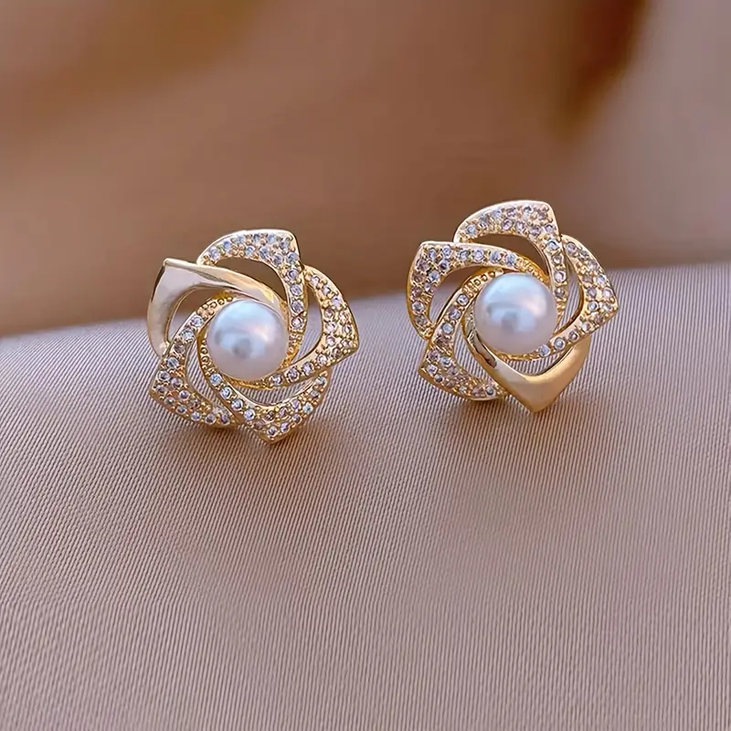 Elegant Spiral Pearl Earrings with Sparkle in Gold